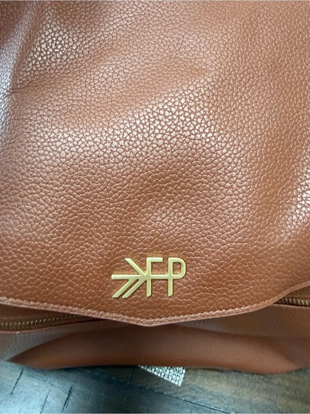Freshly Picked Brown Leather-Textured Backpack with Gold Logo